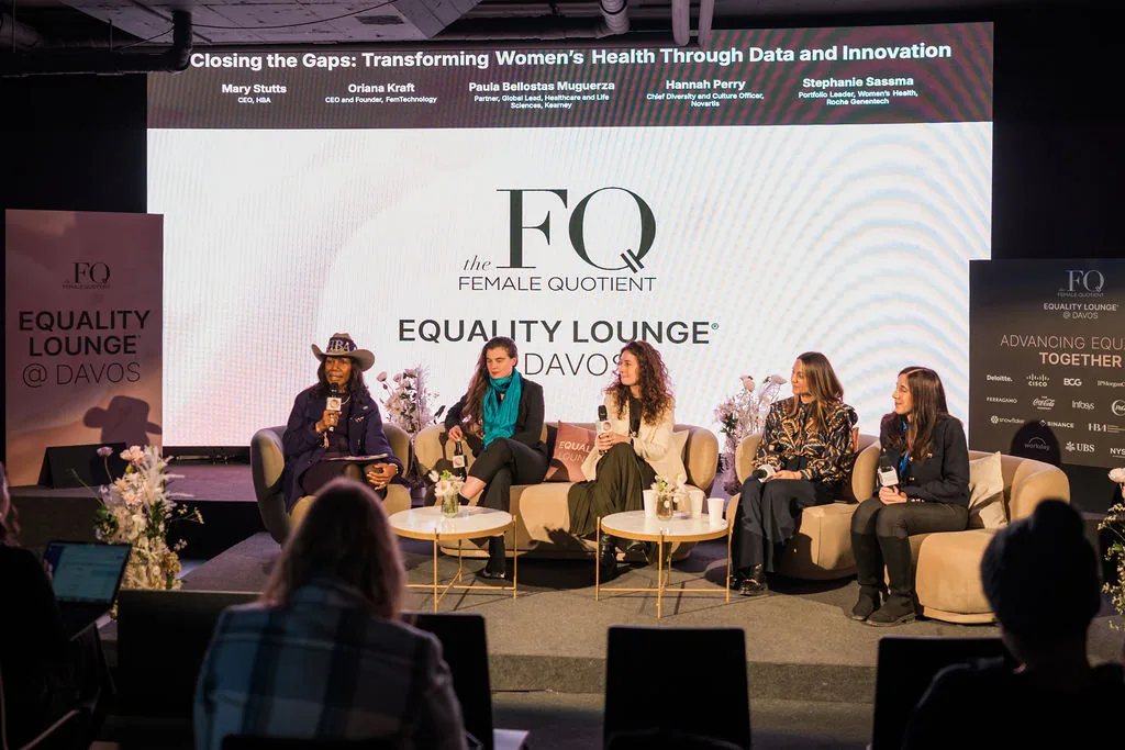A panel on stage at the Equality Lounge, 'Closing the Gaps: Transforming Women's Health Through Data and Innovation'