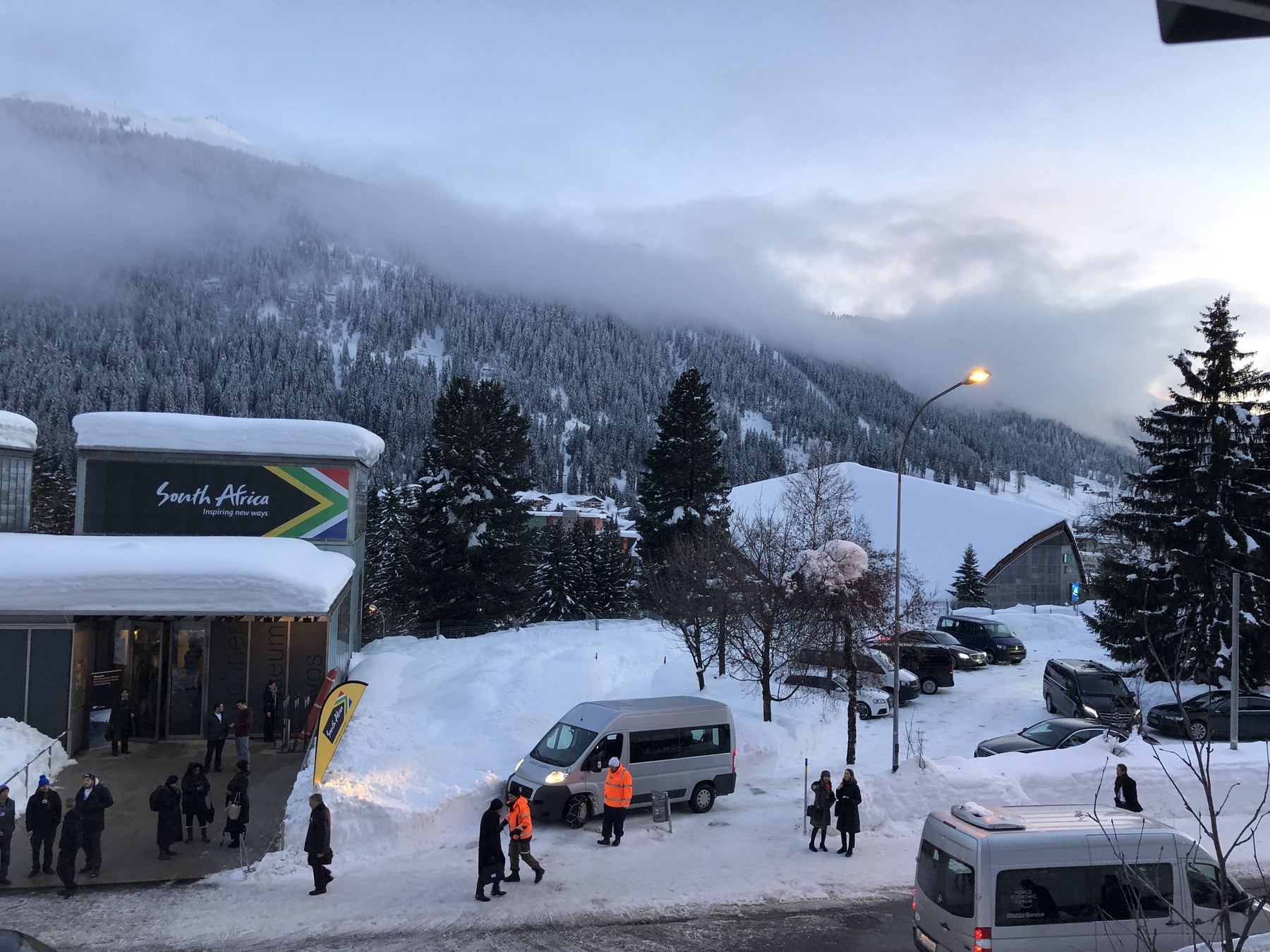 The South Africa House pavilion in Davos, with WEF shuttle vans outside
